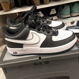 Nike big kids Air Force one’s. Black/black/white. Nickname Panda
